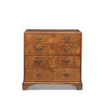 A George II caddy top walnut chest of tall proportions