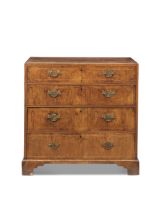 A George II caddy top walnut chest of tall proportions