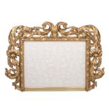 An 18th century Italian carved wood and gilt gesso mirror or picture over-frame probably Florent...