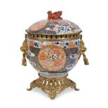 A French gilt bronze mounted Japanese Imari porcelain bowl and cover the porcelain probably Mei...