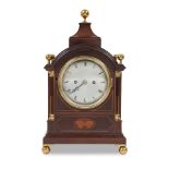 A late 19th century brass mounted mahogany and inlaid bracket/table clock in the George III style