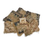 A group of 17th Century Flemish tapestry border fragments made up as cushions (9)