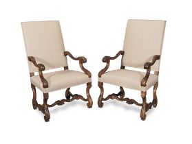 A pair of French walnut fauteuils or armchairs in the Louis XIV style Apparently late 19th/early...