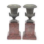 A pair of late 19th century French patinated bronze and rosso antico marble garniture urns (2)
