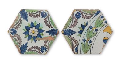 Two Italian Maiolica glazed floor tiles, in the manner of Luca della Robbia (Italian, 1399/1400-...