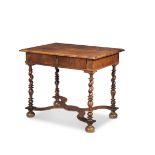 A walnut side table largely late 17th/early 18th century; the legs and stretcher probably associ...