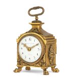 A late 19th/early 20th century French gilt brass pendule d'officier timepiece of small size the ...