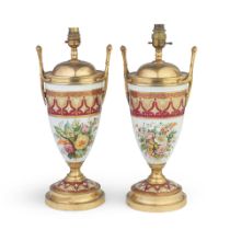 A pair of gilt brass mounted Continental porcelain lamp bases probably early 20th century (2)