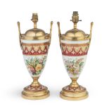 A pair of gilt brass mounted Continental porcelain lamp bases probably early 20th century (2)