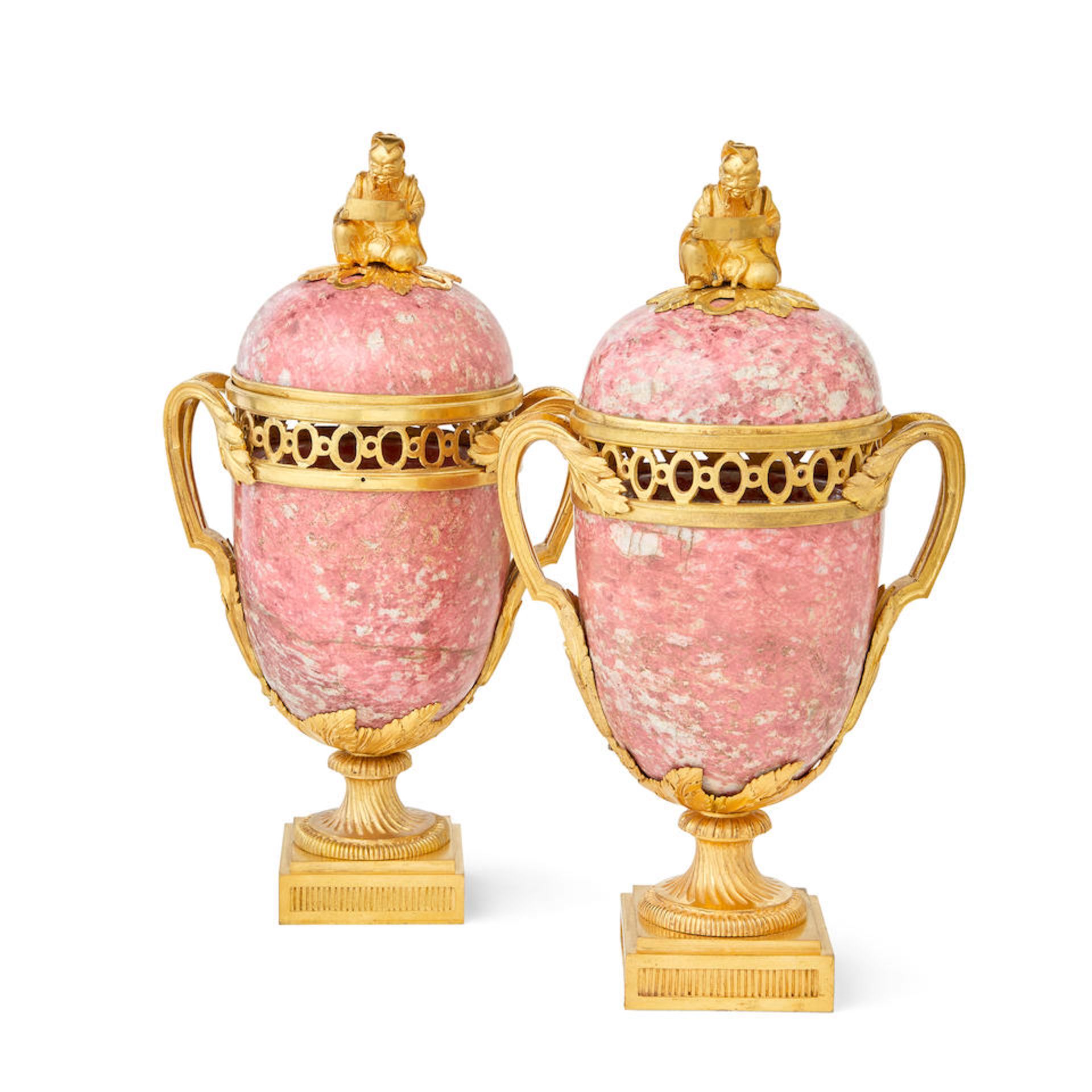 A pair of ormolu mounted pink granite pot-pourri vases in the Louis XVI style, part late 18th ce...