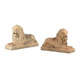 A pair of substantial late 19th century moulded terracotta models of recumbent lions by J&M Crai...