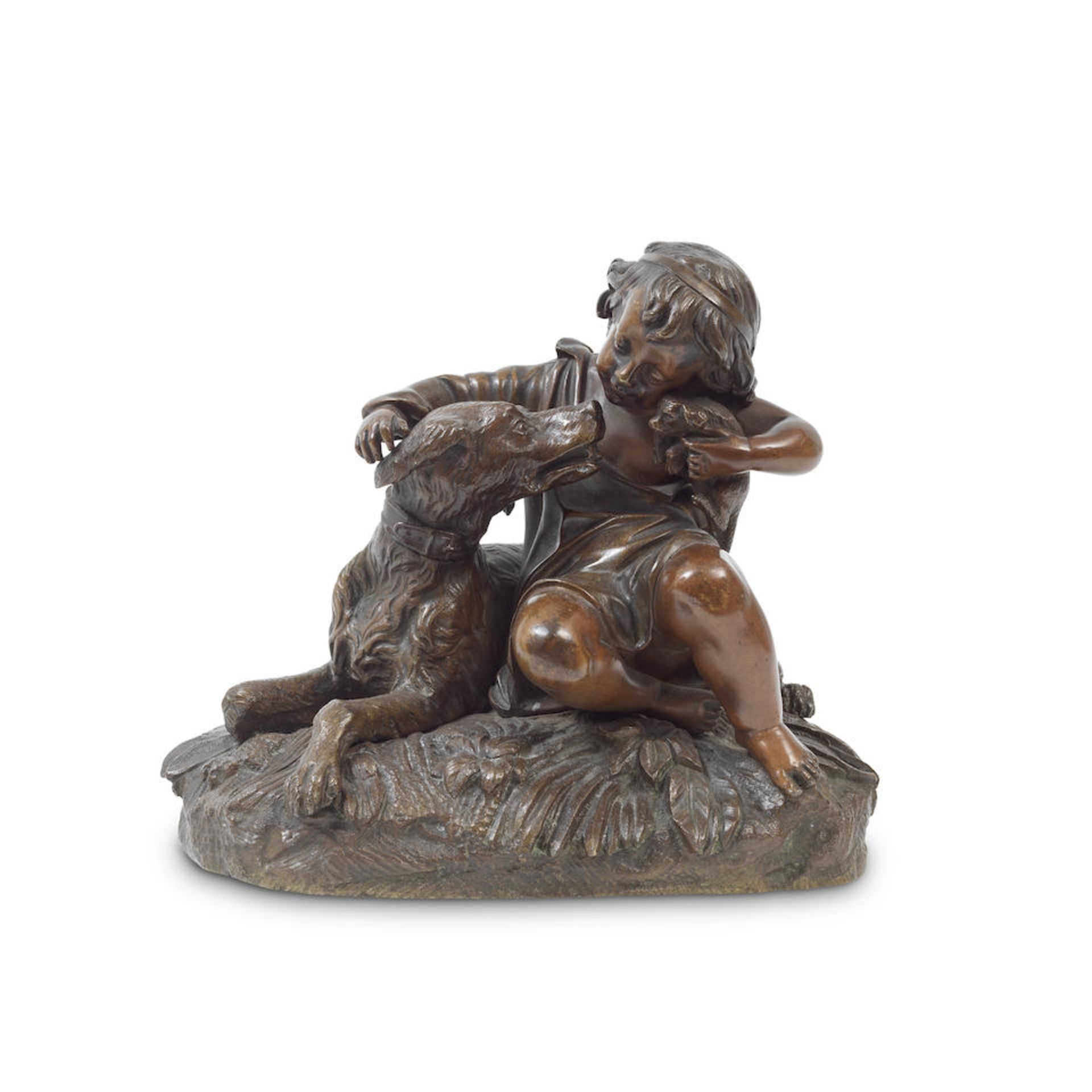 A mid 19th century French gilt bronze figure of a child and a seated hound