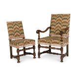 A matched set of twelve walnut dining chairseight chairs evidently ranging in date from the 17th...