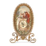 A late 19th/early 20th century French gilt metal porcelain decorative strut timepiece