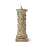 A late 19th century terracotta garden pedestal, together with an associated bronze sundial the ...