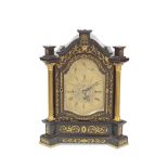 A late 19th century brass mounted and inlaid ebonised chiming bracket/table clock the dial signe...