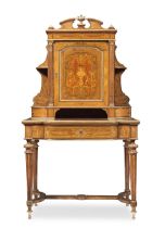 A Napoleon III ormolu mounted burr yew, walnut, amboyna, amaranth, stained sycamore and fruitwoo...