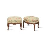 A pair of 19th century French provincial stained beech stools in the Regence style (2)