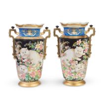 A pair of unusual early 20th century French porcelain vases