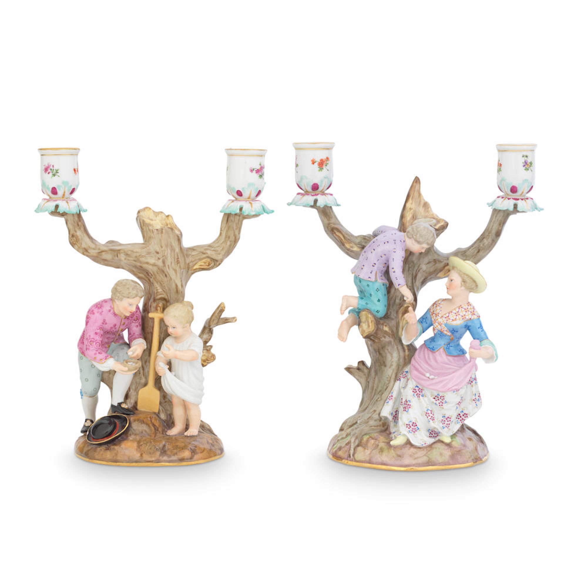 A matched pair of Meissen figural twin light dwarf candelabra modelled as egg collectors late 19...