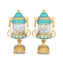 A pair of late 19th century gilt bronze mounted French porcelain garniture vases and covers in ...