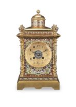 A late 19th/early 20th century French gilt brass and champlevé enamel mantel clock the move...