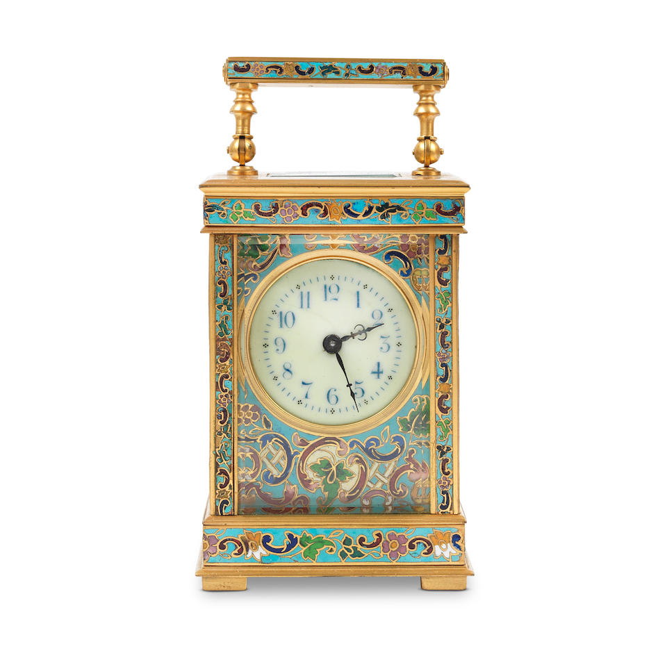An early 20th century gilt brass and champlevé enamel carriage timepiece the backplate stam...