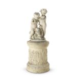 A late 19th century terracotta figural group of two putti allegorical of autumn raised on associ...