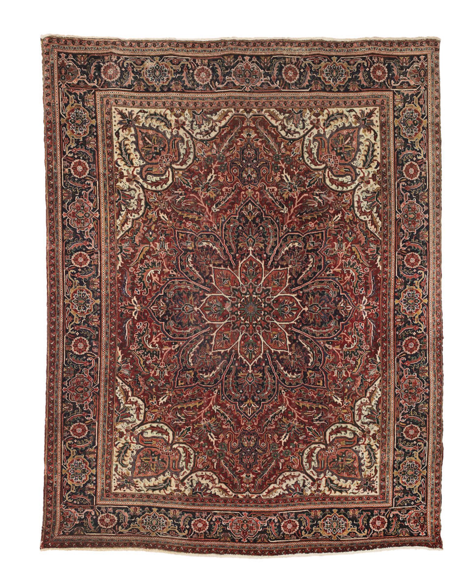 A Tabriz carpet North West Persia, 394cm x 305cm (at the longest point)