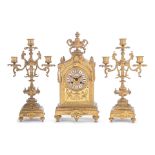 A late 19th century French gilt bronze clock garniture the dial signed Philippe Ft, 66 Palais Ro...