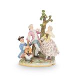 A Meissen porcelain figural group of a pair of courtly lovers with attendant figure probably lat...