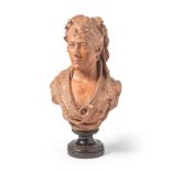 An early 20th century sculpted terracotta bust or a lady the rear indistinctly signed, possibly ...