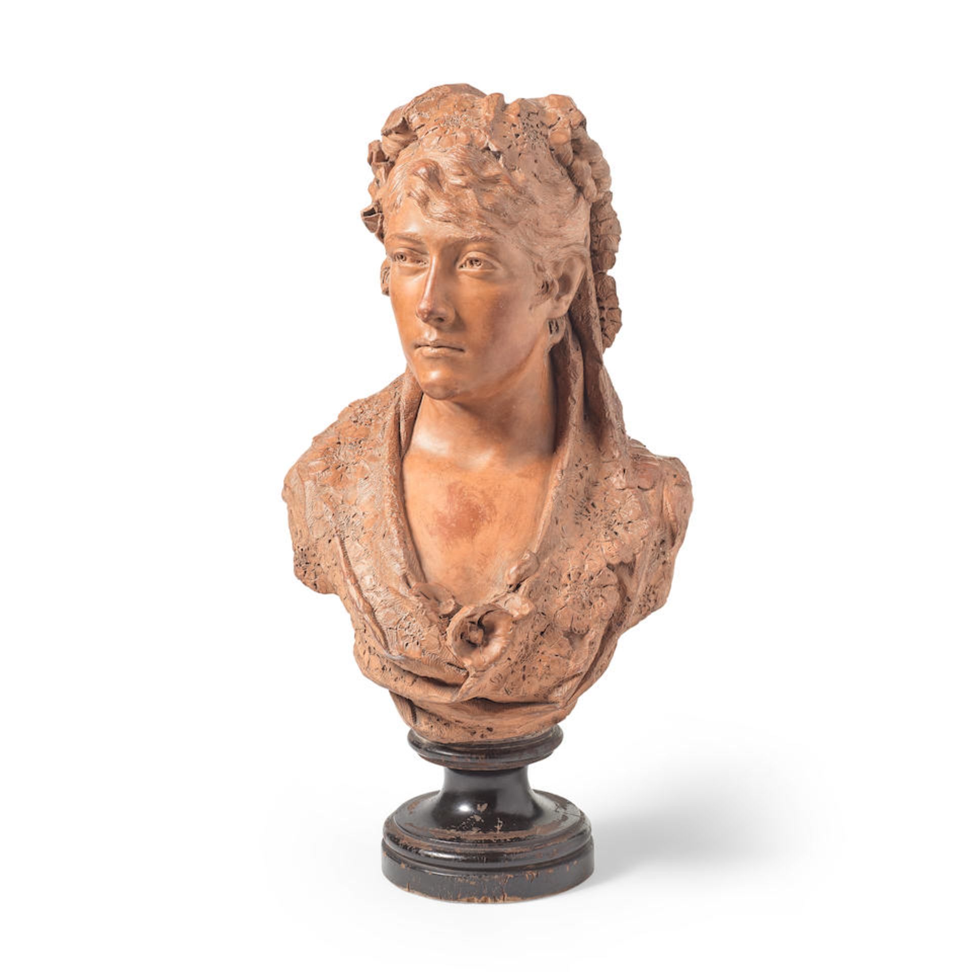 An early 20th century sculpted terracotta bust or a lady the rear indistinctly signed, possibly ...