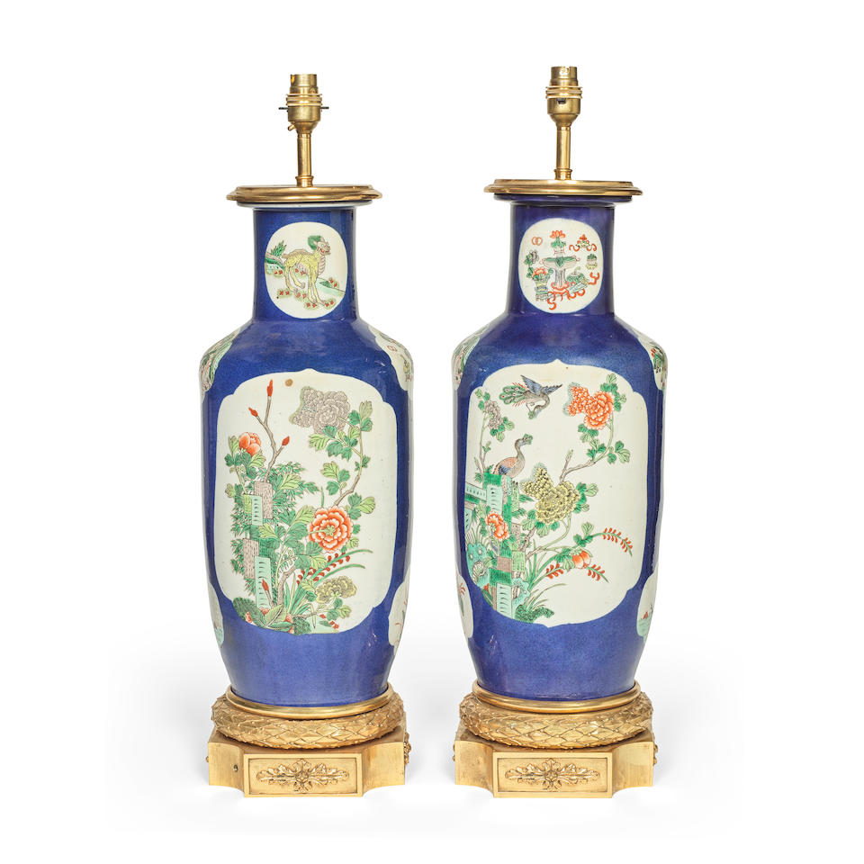 A pair of gilt brass mounted Chinese porcelain vases later adapted as lamp bases the porcelain p...