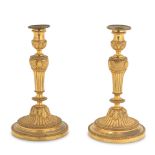 A pair 19th century French gilt bronze candlesticks in the Louis XVI style (2)