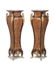 A pair of French early 20th century gilt bronze mounted rosewood, bois satine, tulipwood, amaran...