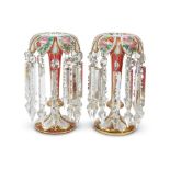 A pair of late 19th century Bohemian overlaid ruby glass table lustres