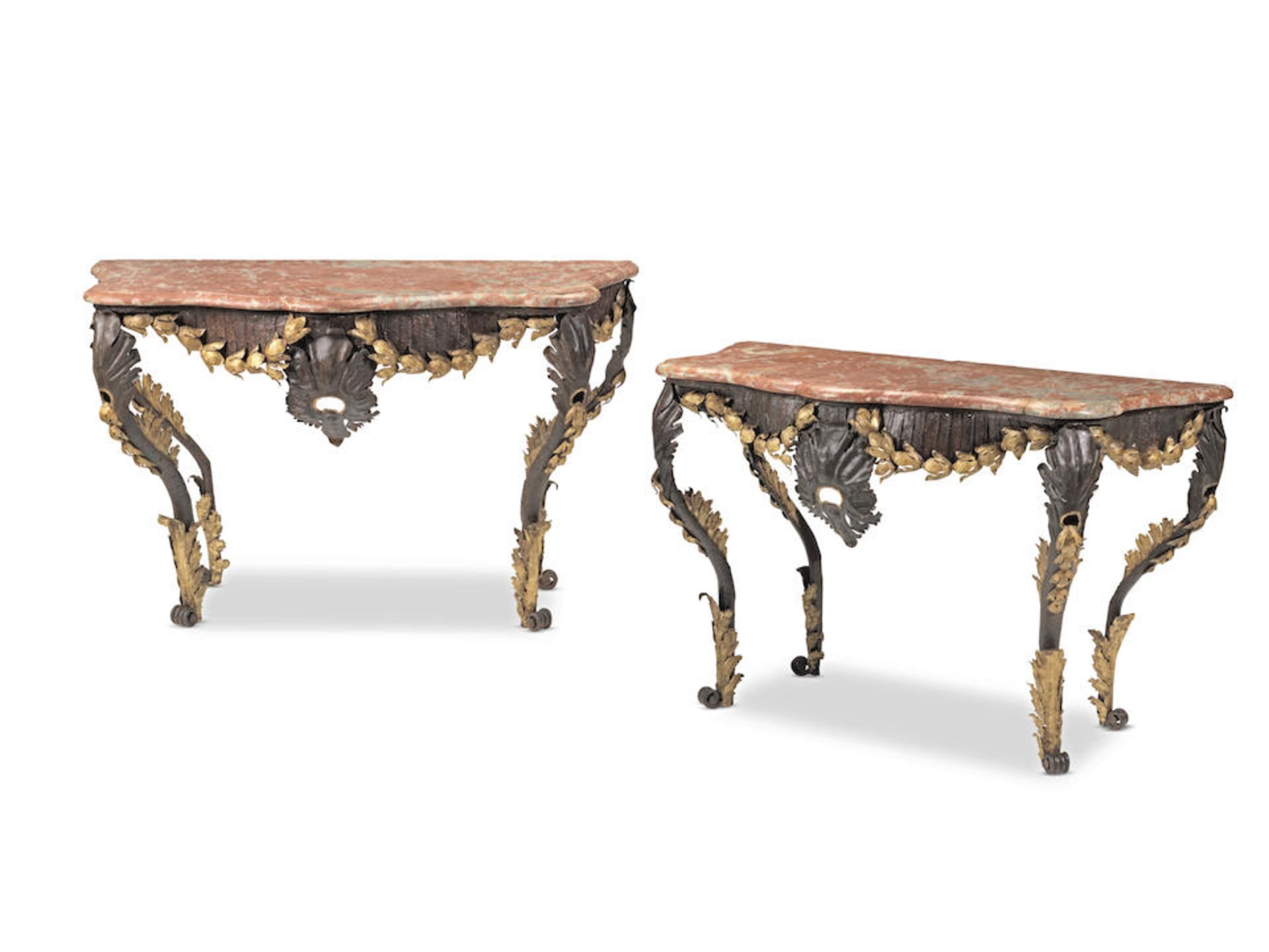 A pair of first half 20th century patinated pressed iron and parcel gilt metal console tables 19...