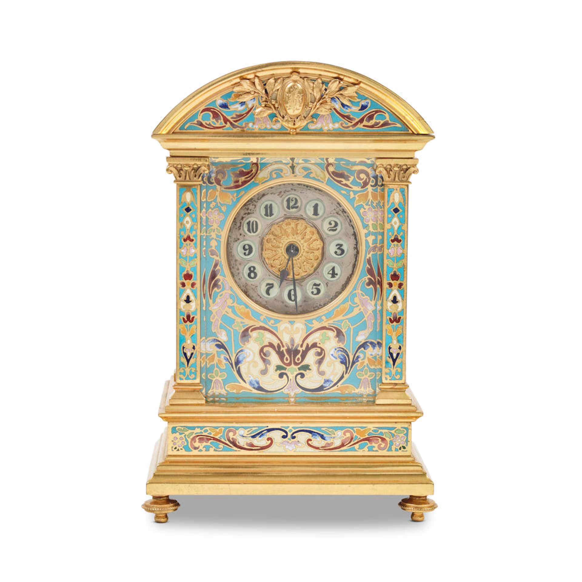 An early 20th century French gilt brass and champlevé enamel mantel clock