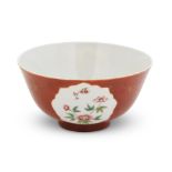 A Chinese Famille Rose and iron red ground porcelain bowl the underside with a Daoguang seal mar...