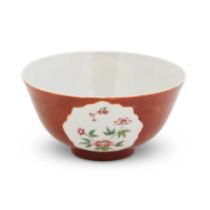 A Chinese Famille Rose and iron red ground porcelain bowl the underside with a Daoguang seal mar...