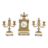 An early 20th century French gilt brass and white marble clock garniture in the Louis XVI taste,...