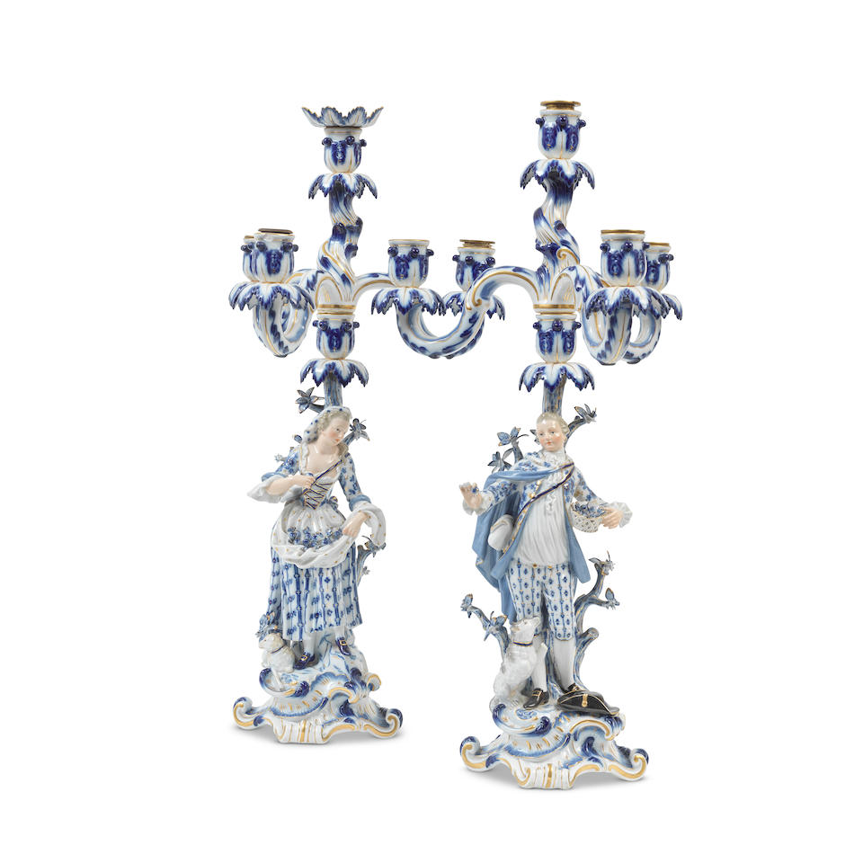 A pair of late 19th century Meissen figural three light candelabra