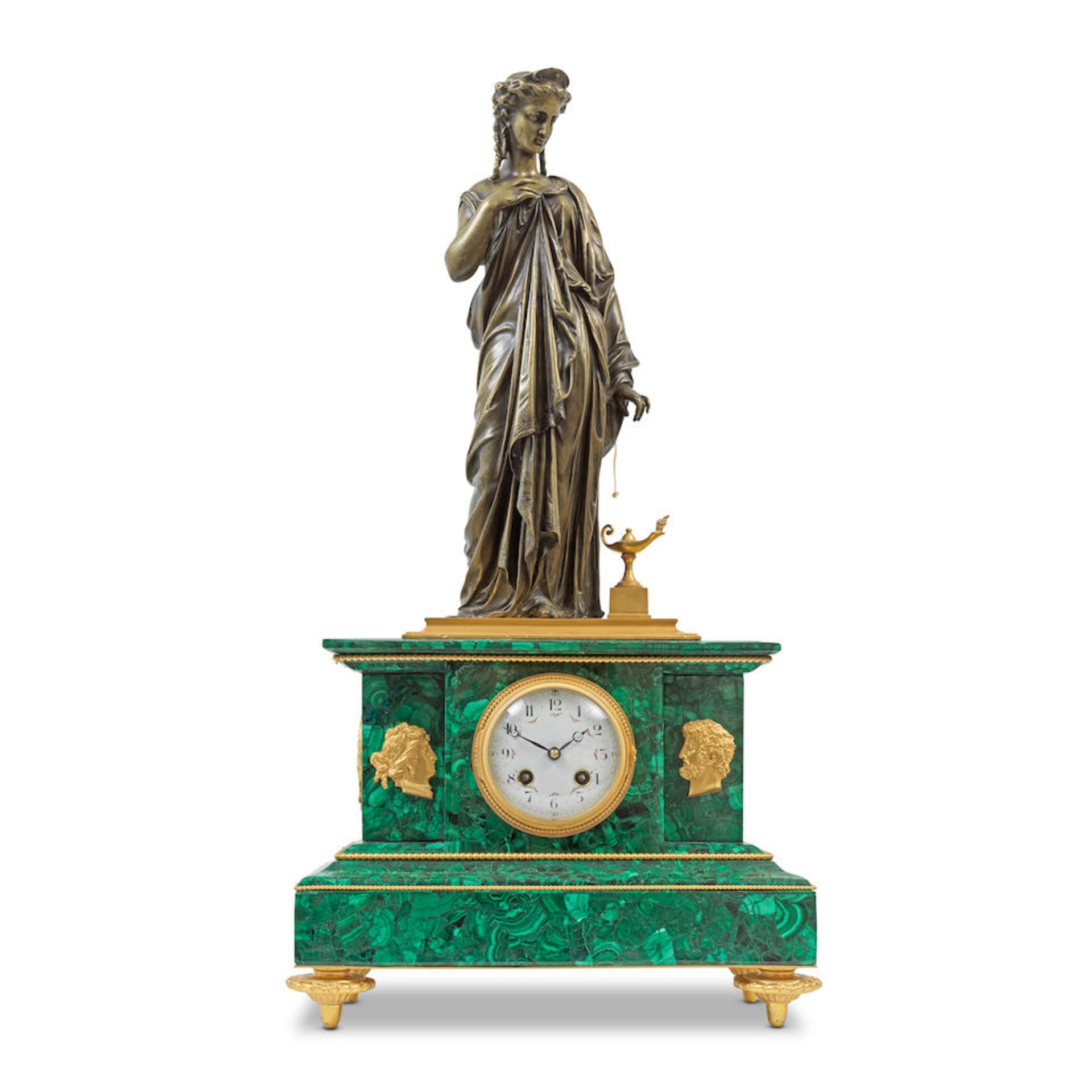 A late 19th century gilt and patinated bronze and later malachite clad figural mantel clock the ...