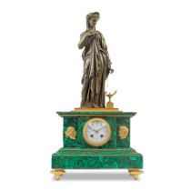 A late 19th century gilt and patinated bronze and later malachite clad figural mantel clock the ...