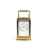 A late 19th century French brass carriage clock with repeat the backplate with RC snakes head ov...