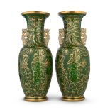 A pair of mid 19th century English ironstone green ground hall vases in the Chinoiserie taste (2)