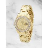 Rolex. A lady's 18K gold and diamond set automatic calendar bracelet watch Rolex. Montre bracele...