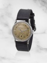 Patek Philippe. A fine and rare stainless steel manual wind wristwatch retailed by Hausmann & Co...