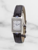 Jaeger-LeCoultre. An 18K white gold rectangular reversible manual wind diamond set wristwatch Ja...